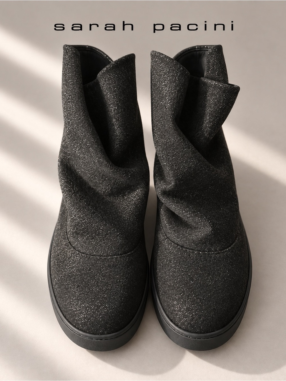 Sarah Pacini 🏛️ - black metallic slouch booties